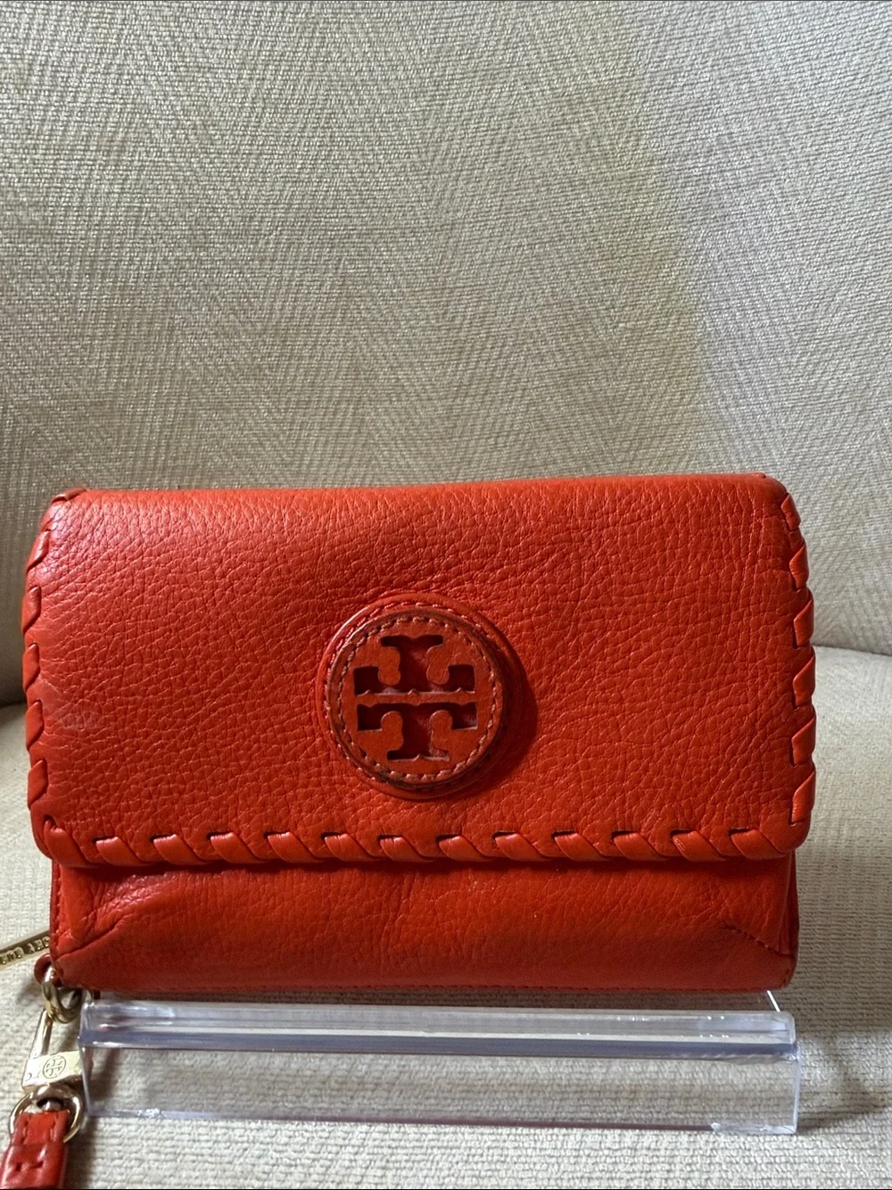 Tory Burch Orange Leather Wristlet with Logo Medallion